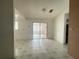 Bright dining room with tiled floors and sliding glass doors at 282 W Summit St, Apopka, FL 32712