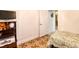 Small bedroom with twin bed and access to another room at 3264 River Branch Cir, Kissimmee, FL 34741