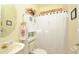 Small bathroom with shower and white vanity at 3330 Earle Ct, Kissimmee, FL 34746