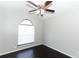 Bright bedroom with dark hardwood floors and ceiling fan at 3473 Hillmont Cir, Orlando, FL 32817