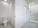 Bathroom with toilet and access to shower at 429 Tisone Ln, Davenport, FL 33837