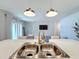 Double stainless steel sink with a modern faucet in a bright kitchen at 429 Tisone Ln, Davenport, FL 33837