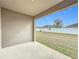 Covered patio with view of backyard at 429 Tisone Ln, Davenport, FL 33837