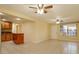 Living room, kitchen, and dining combo with tile floors at 4355 E Michigan St # 4355, Orlando, FL 32812