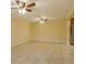 Bright living room with tile floors and ceiling fans at 4355 E Michigan St # 4355, Orlando, FL 32812