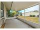 Spacious screened porch, perfect for relaxing outdoors at 4355 E Michigan St # 4355, Orlando, FL 32812