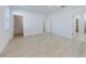 Large bedroom with light wood flooring and ample closet space at 4462 Lions Gate Ave, Clermont, FL 34711