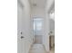 Clean hallway showing access to bedroom and bathroom at 4462 Lions Gate Ave, Clermont, FL 34711