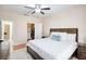 Bedroom with large closet and wood flooring at 4833 Cypress Woods Dr # 4101, Orlando, FL 32811