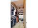 Walk-in closet with ample shelving and hanging space at 4833 Cypress Woods Dr # 4101, Orlando, FL 32811