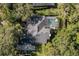 Aerial view showcasing home, pool, and backyard at 4847 Shoreline Cir, Sanford, FL 32771