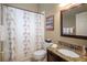 Clean bathroom with shower/tub combo and granite vanity at 4847 Shoreline Cir, Sanford, FL 32771