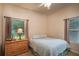 Bright bedroom with a double bed and plenty of closet space at 4847 Shoreline Cir, Sanford, FL 32771