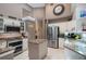 Modern kitchen with granite counters and island at 4847 Shoreline Cir, Sanford, FL 32771