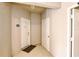 Condo entryway with two doors and a doormat at 4897 Cypress Woods Dr # 6303, Orlando, FL 32811