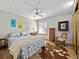 Bedroom with a cowhide rug and rocking chair at 6541 Fairway Hill Ct, Orlando, FL 32835