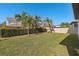 Expansive backyard with tropical landscaping and privacy fence at 8324 Vivaro Isle Way, Windermere, FL 34786