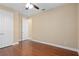 Bright bedroom with hardwood floors and closet at 8324 Vivaro Isle Way, Windermere, FL 34786