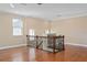 Loft area with hardwood floors and iron railing at 8324 Vivaro Isle Way, Windermere, FL 34786