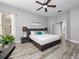 Relaxing main bedroom with king-size bed and large window at 837 Ashbrooke Ct, Lake Mary, FL 32746