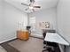 Bright home office features wood desk and ample workspace at 837 Ashbrooke Ct, Lake Mary, FL 32746