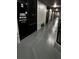 Night view of hallway with locksmith signage at 8421 S Orange Blossom Trl # 441, Orlando, FL 32809