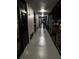 Clean, well-lit interior hallway with dark flooring at 8421 S Orange Blossom Trl # 441, Orlando, FL 32809