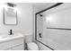 Clean bathroom with a shower/tub combo and white vanity at 105 Clyde Ave, Longwood, FL 32750