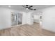 Bright dining room with vinyl flooring and view of the kitchen at 105 Clyde Ave, Longwood, FL 32750