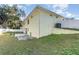 Exterior view of house with backyard and patio at 109 Wynot Way, Deland, FL 32724