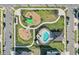 Community pool and playgrounds from above at 1122 Seaside Mist Trl, Kissimmee, FL 34747