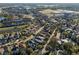 Aerial view of a neighborhood with tree-lined streets at 11560 Ashlin Park Blvd, Windermere, FL 34786