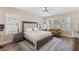 Spacious bedroom with wood flooring and large windows at 11560 Ashlin Park Blvd, Windermere, FL 34786