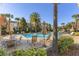 Resort-style pool with patio furniture and palm trees at 11560 Ashlin Park Blvd, Windermere, FL 34786