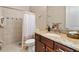 Bathroom with granite countertop, shower, and toilet at 11748 Waterstone Loop Dr, Windermere, FL 34786