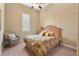 Bedroom with a comfortable bed and seating area at 11748 Waterstone Loop Dr, Windermere, FL 34786