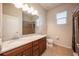 Bathroom with granite countertop and shower/tub combo at 121 Whirlaway Dr, Davenport, FL 33837