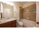 Bathroom with granite countertop and shower at 121 Whirlaway Dr, Davenport, FL 33837