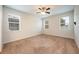 Spacious bedroom with neutral walls and carpet flooring at 121 Whirlaway Dr, Davenport, FL 33837