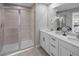 Bathroom with double vanity, large shower, and modern fixtures at 12463 Shipwatch St, Orlando, FL 32832