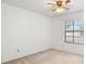 Well-lit bedroom with large window and ceiling fan at 1360 Cherrybark Rd, Apopka, FL 32703