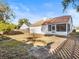 Home exterior with screened porch and fenced backyard at 1360 Cherrybark Rd, Apopka, FL 32703