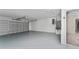 Spacious garage with painted floor and ample storage at 1365 Indian Rock Ct, Deltona, FL 32725