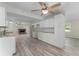 Updated kitchen featuring white shaker cabinets and granite at 1365 Indian Rock Ct, Deltona, FL 32725