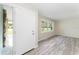 Bright living room with gray vinyl plank flooring at 1365 Indian Rock Ct, Deltona, FL 32725