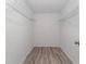 Spacious walk-in closet with wire shelving and light wood-look flooring at 1365 Indian Rock Ct, Deltona, FL 32725