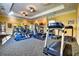 Well-equipped fitness center with cardio and strength training equipment at 1371 Tuscan Ter # 3307, Davenport, FL 33896