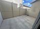 Private backyard with a paved patio area and privacy fence at 13731 Bravante Aly, Windermere, FL 34786