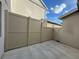 Private backyard with a tan vinyl fence and gate at 13731 Bravante Aly, Windermere, FL 34786