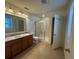 Double vanity bathroom with shower and linen closet at 13731 Bravante Aly, Windermere, FL 34786